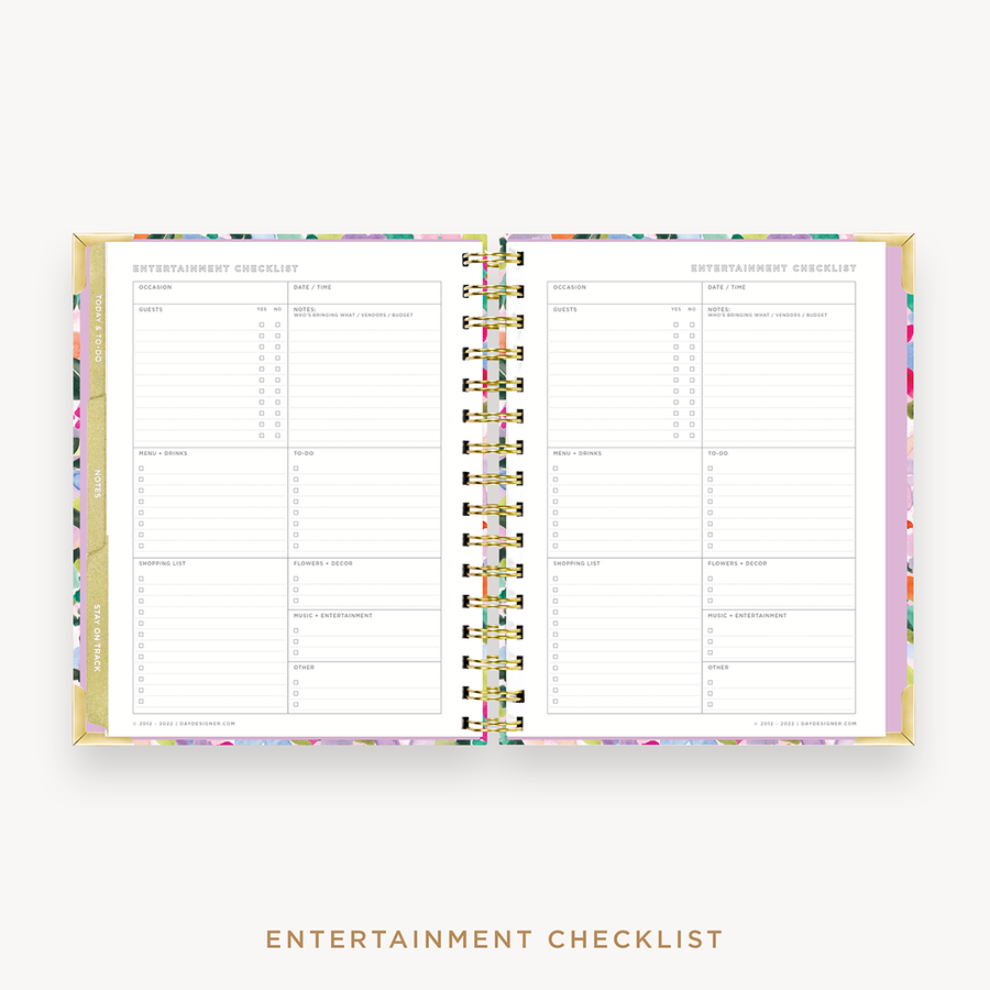 Day Designer's 2023 Weekly Mini Planner Blurred Spring with entertainment checklist page.