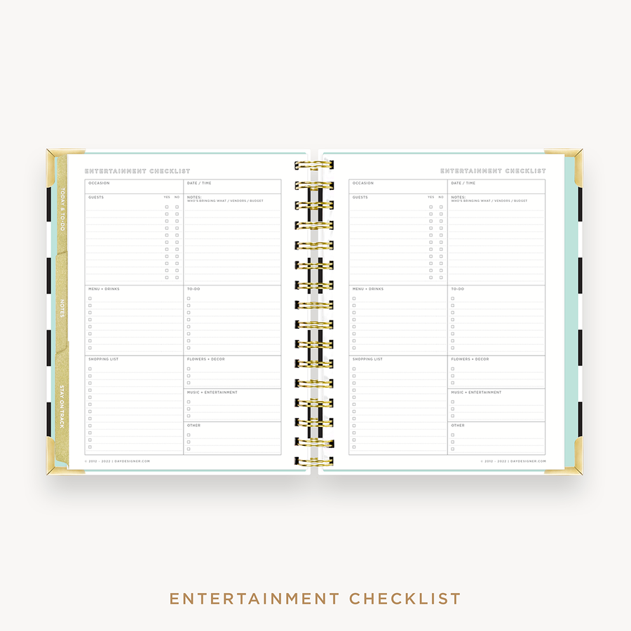 Day Designer's 2023 Weekly Mini Planner Black Stripe with entertainment checklist page.