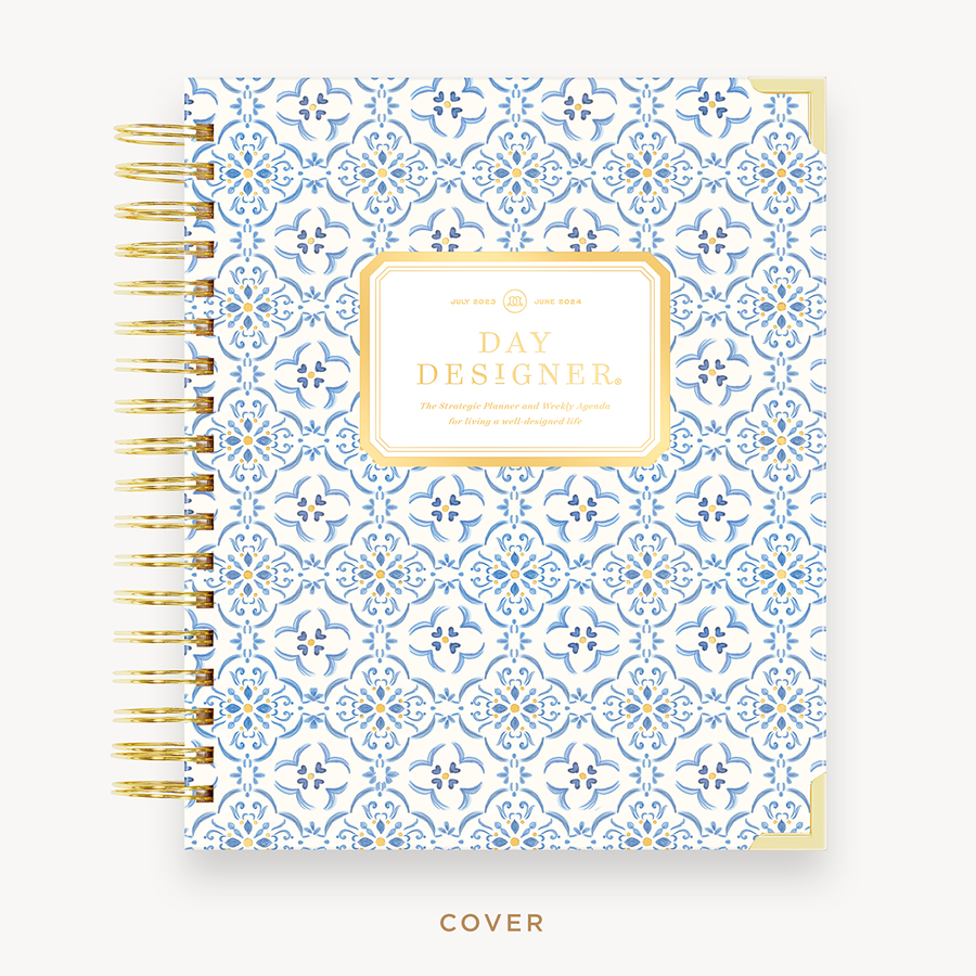 Day Designer's 2023 Weekly Planner with Casa Bella hard cover and gold spiral binding.