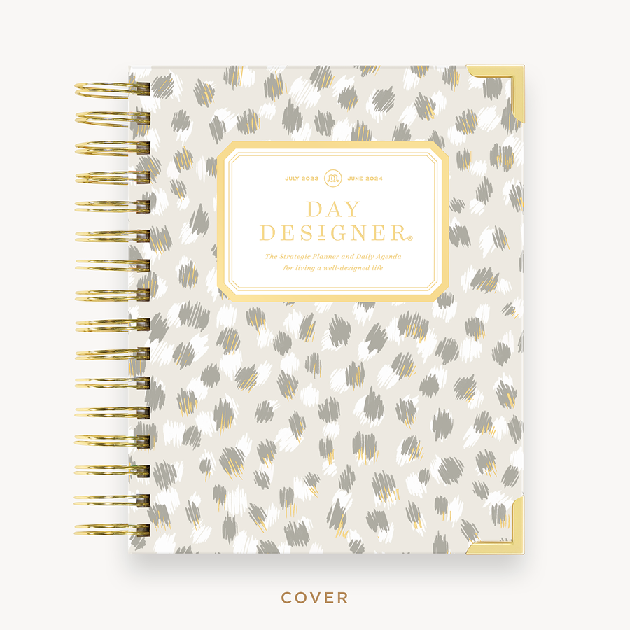 Day Designer's 2023-24 Daily Mini Planner with Chic hard cover and gold spiral binding.