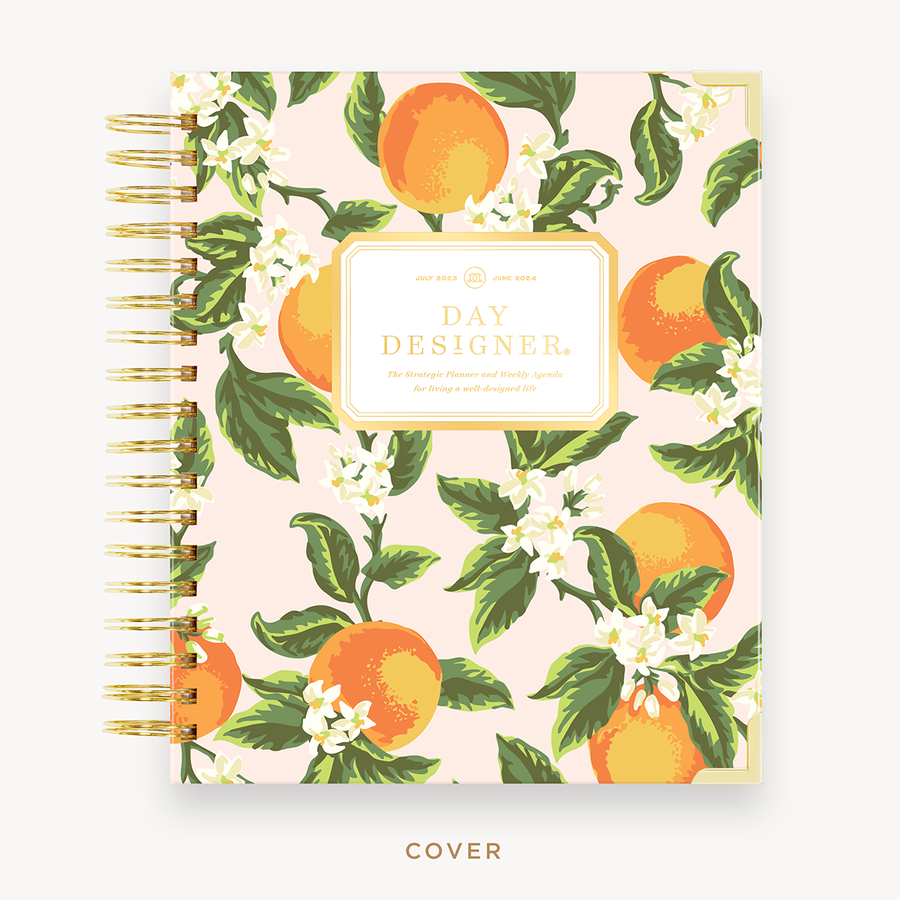 Day Designer's 2023-24 Weekly Planner with Orange Blossom hard cover and gold spiral binding.
