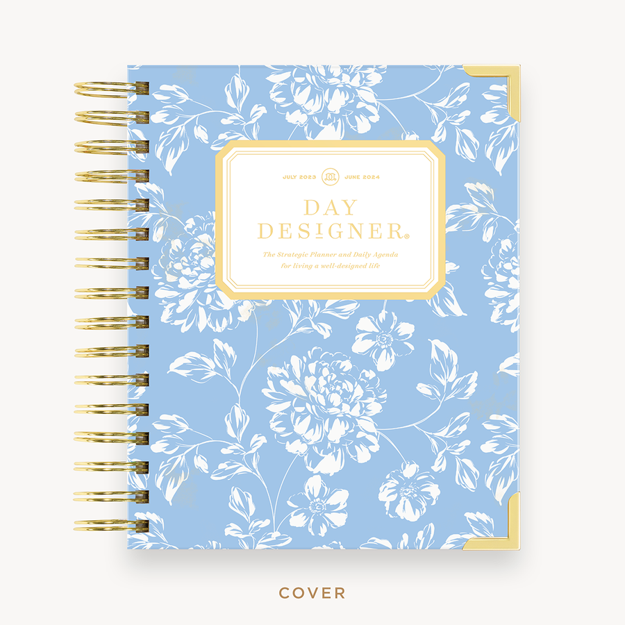 Day Designer's 2023 Daily Mini Planner with Annabel hard cover and gold spiral binding.