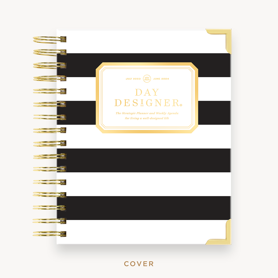 Day Designer's 2023 Weekly Mini Planner with Black Stripe hard cover and gold spiral binding.