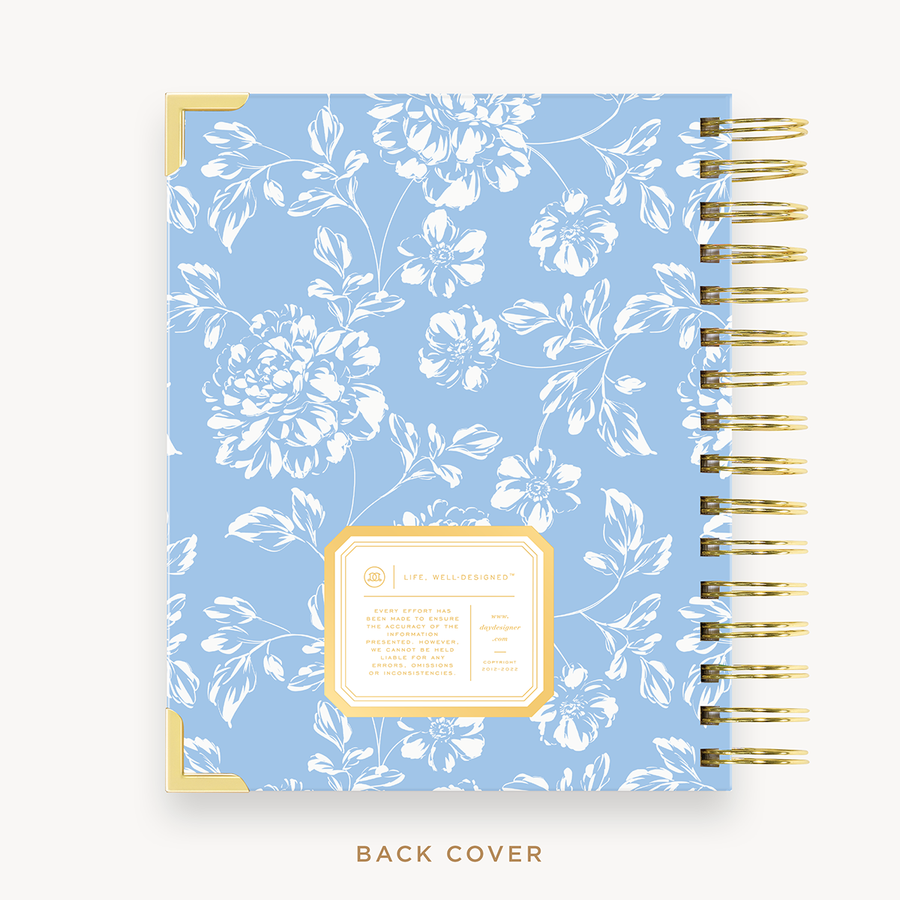 Day Designer's 2023 Weekly Mini Planner with Annabel back cover and gold spiral binding.