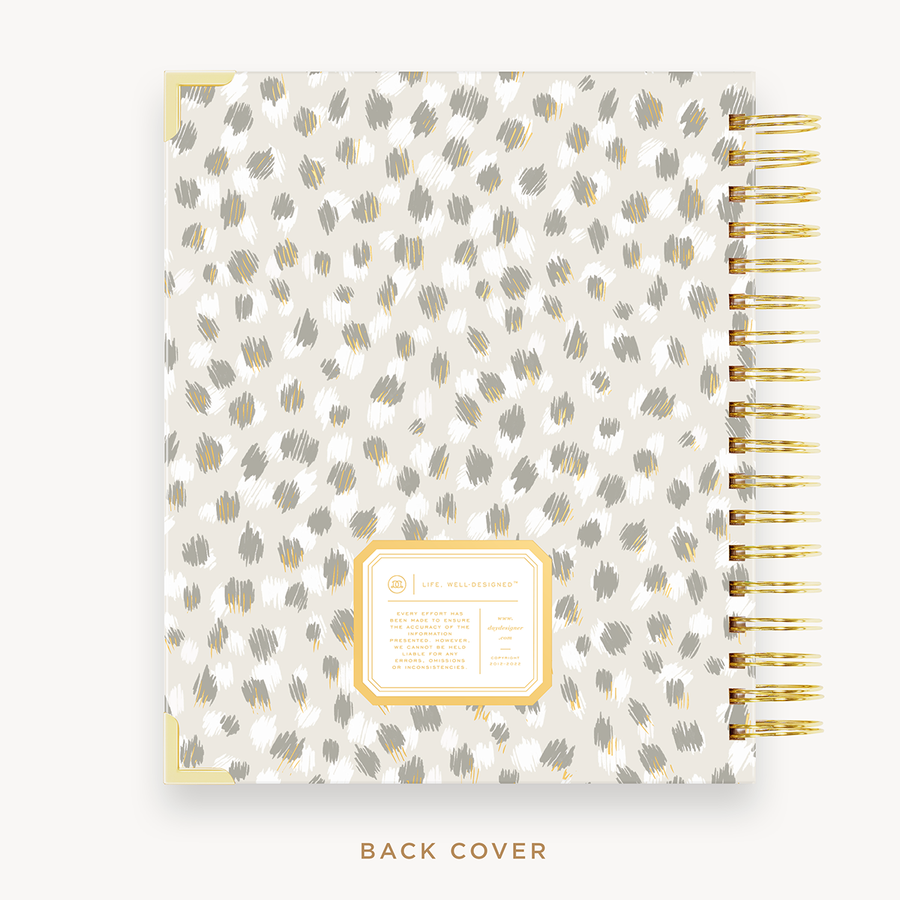 Day Designer's 2023-24 Weekly Planner with Chic back cover and gold spiral binding.