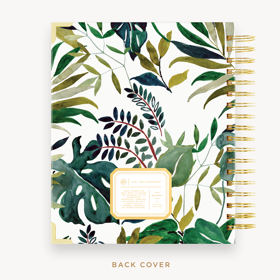 Day Designer's 2023 Weekly Planner with Bali back cover and gold spiral binding.