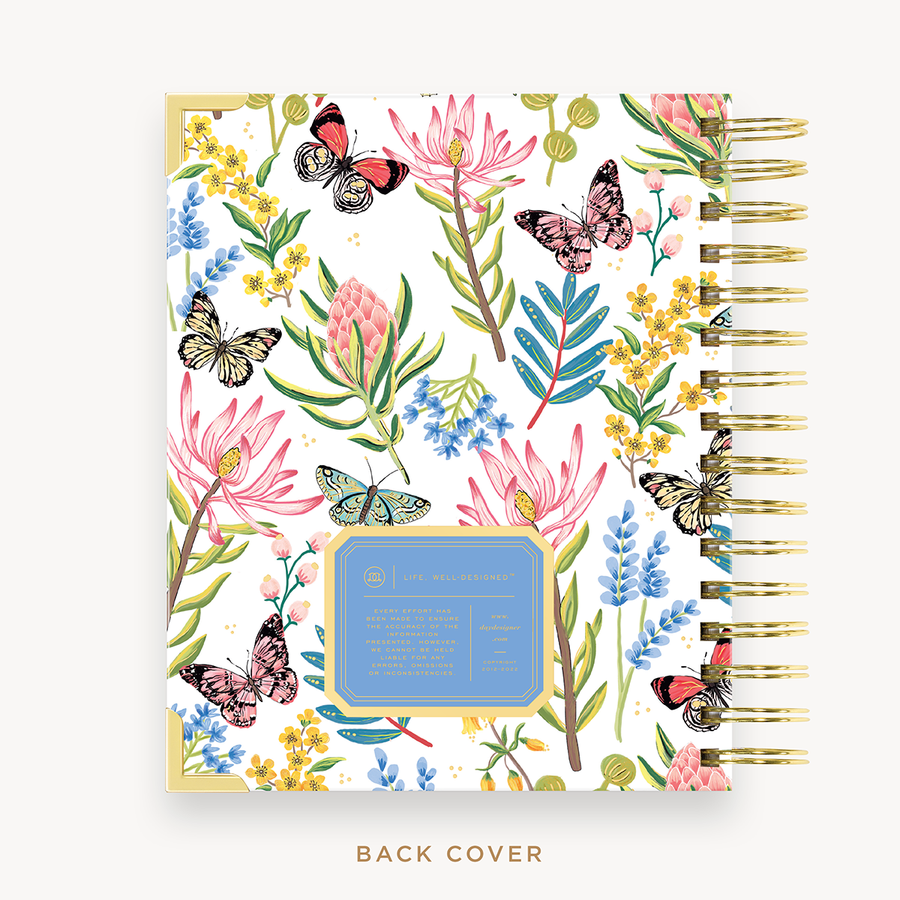 Day Designer's 2023-24 Daily Mini Planner with Flutter back cover and gold spiral binding.