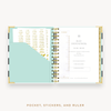 Day Designer's 2023 Weekly Mini Planner Black Stripe with pocket sleeve and gold stickers.
