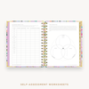 Day Designer's 2023 Daily Mini Planner Blurred Spring with self-assessment and values worksheet.
