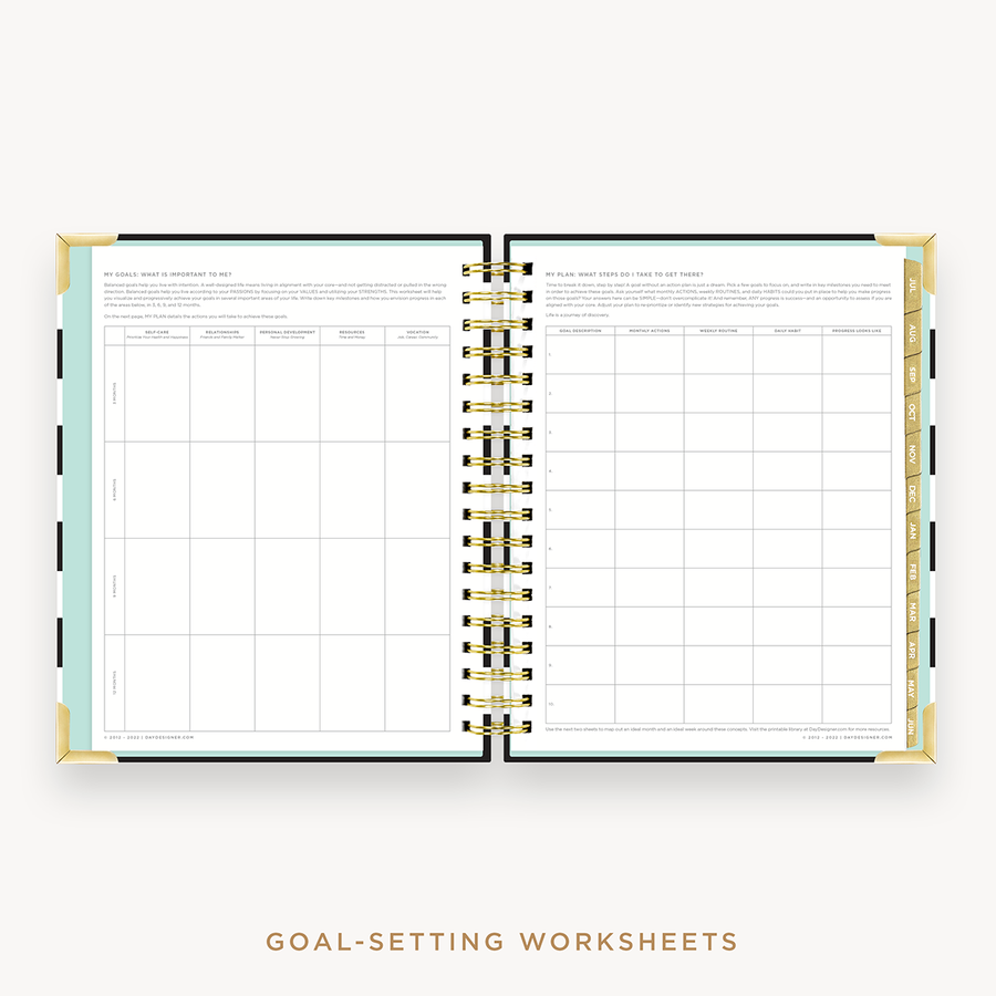 Day Designer's 2023 Weekly Planner Black Stripe with goals worksheet.