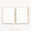 Day Designer's 2023-24 Daily Mini Planner Orange Blossom with a two-page spread of the 2023-24-2024 calendar year.