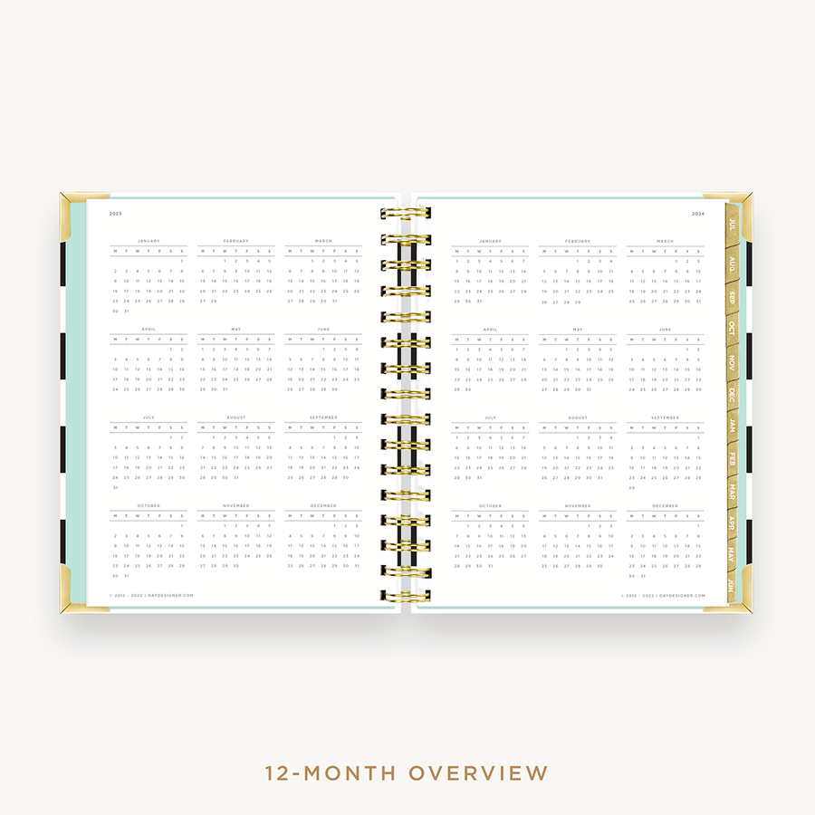 Day Designer's 2023 Weekly Mini Planner Black Stripe with a two-page spread of the 2023-2024 calendar year.