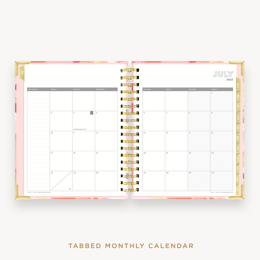 Day Designer's 2023 Weekly Planner Sunset with monthly calendar planning page.