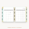 Day Designer's 2023 Daily Mini Planner Black Stripe with monthly calendar planning page.