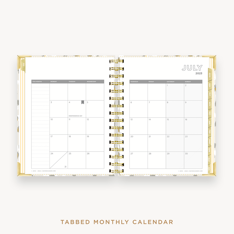 Day Designer's 2023-24 Daily Mini Planner Chic with monthly calendar planning page.