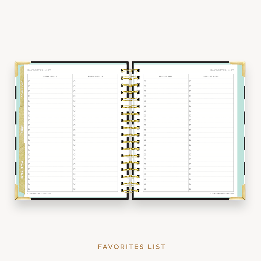 Day Designer's 2023 Weekly Planner Black Stripe with movie and book tracking page.