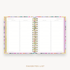 Day Designer's 2023 Weekly Planner Blurred Spring with movie and book tracking page.