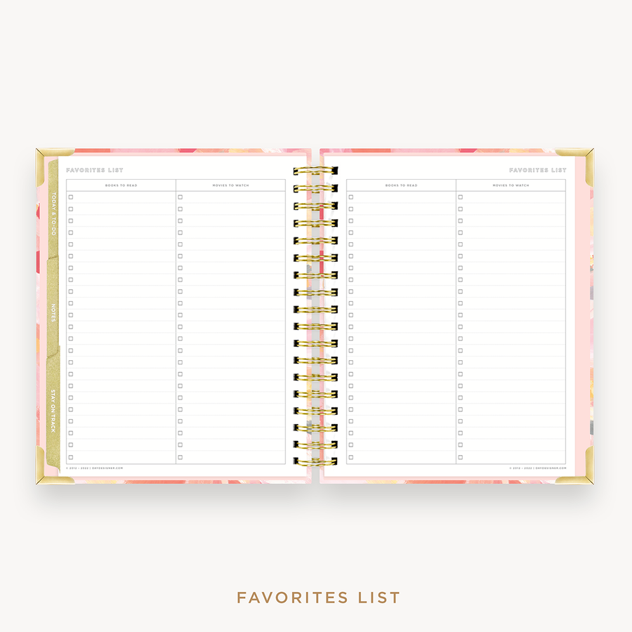 Day Designer's 2023 Weekly Planner Sunset with movie and book tracking page.