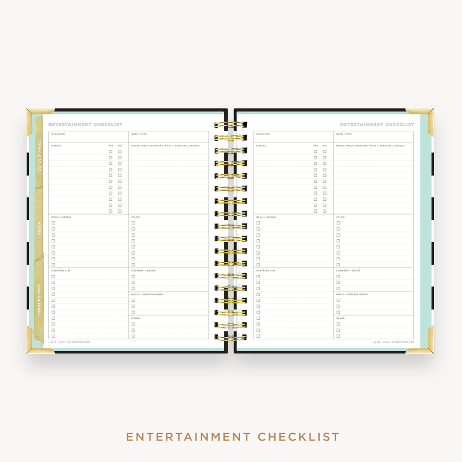 Day Designer's 2023 Weekly Planner Black Stripe with entertainment checklist page.