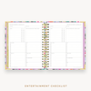 Day Designer's 2023 Weekly Planner Blurred Spring with entertainment checklist page.