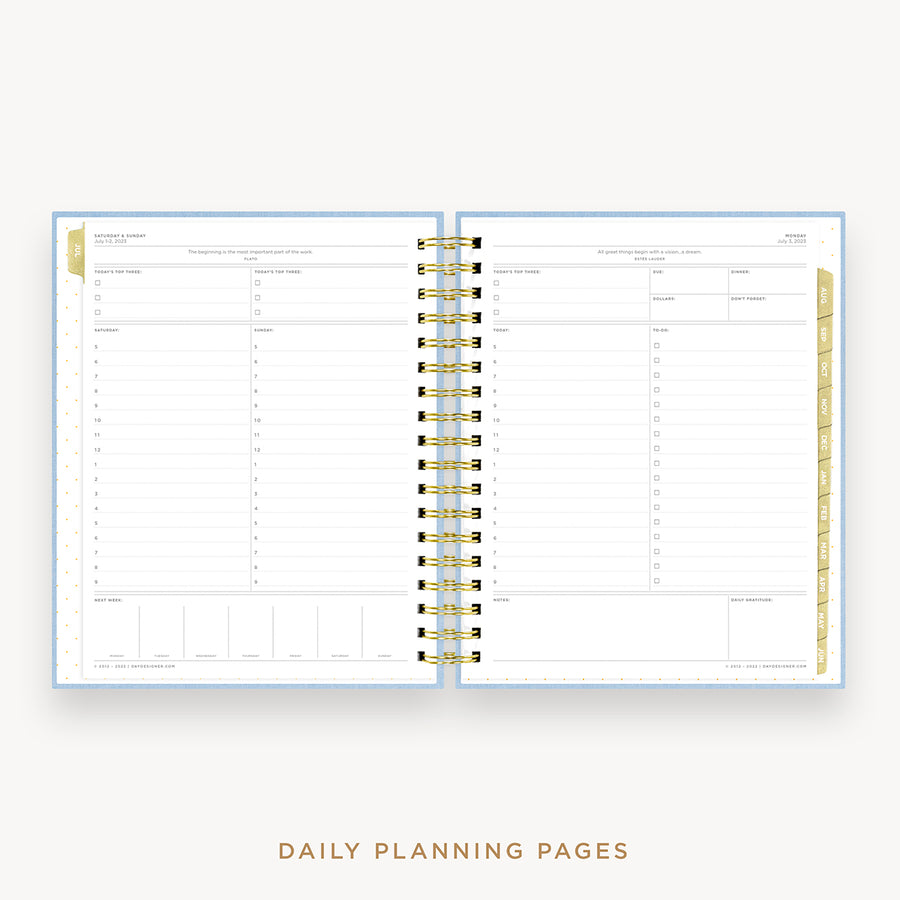 Day Designer's 2023 Daily Planner Chambray Bookcloth with daily planning page.