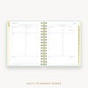 Day Designer's 2023 Daily Mini Planner Sage Bookcloth with daily planning page.