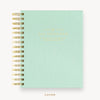 Day Designer's 2023 Daily Mini Planner with Sage Bookcloth hard cover and gold spiral binding.