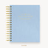 Day Designer's 2023 Daily Mini Planner with Chambray Bookcloth hard cover and gold spiral binding.