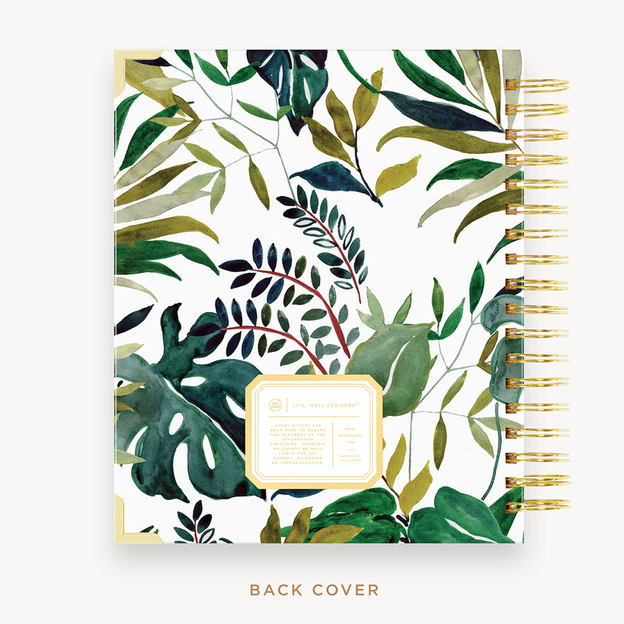 Day Designer's 2023 Daily Planner with Bali back cover and gold spiral binding.
