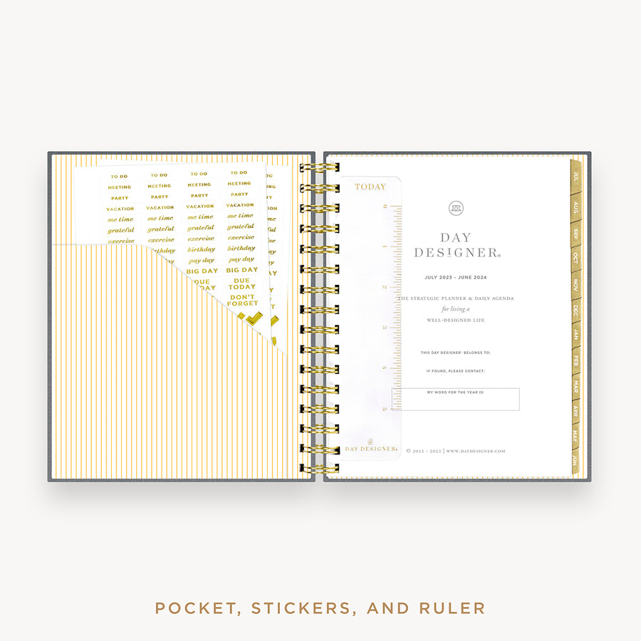 Day Designer's 2023 Daily Mini Planner Charcoal Bookcloth with pocket sleeve and gold stickers.