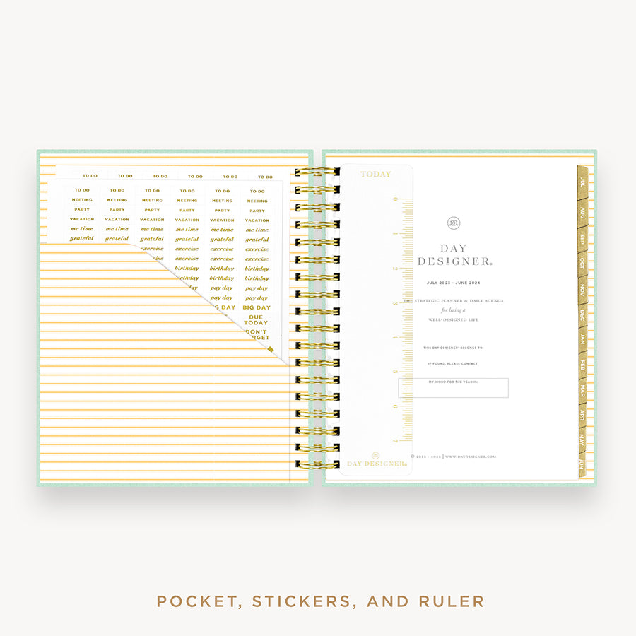 Day Designer's 2023 Daily Planner with Sage Bookcloth cover with pocket sleeve and gold stickers.