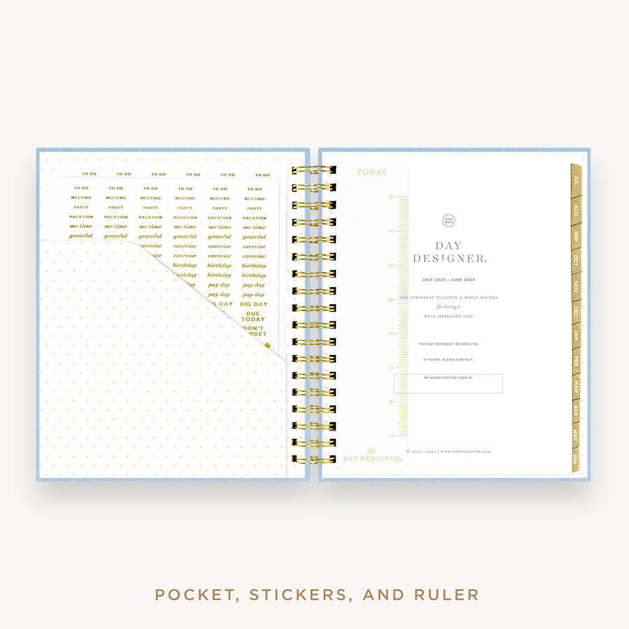 Day Designer's 2023 Daily Planner with Chambray Bookcloth cover with pocket sleeve and gold stickers.