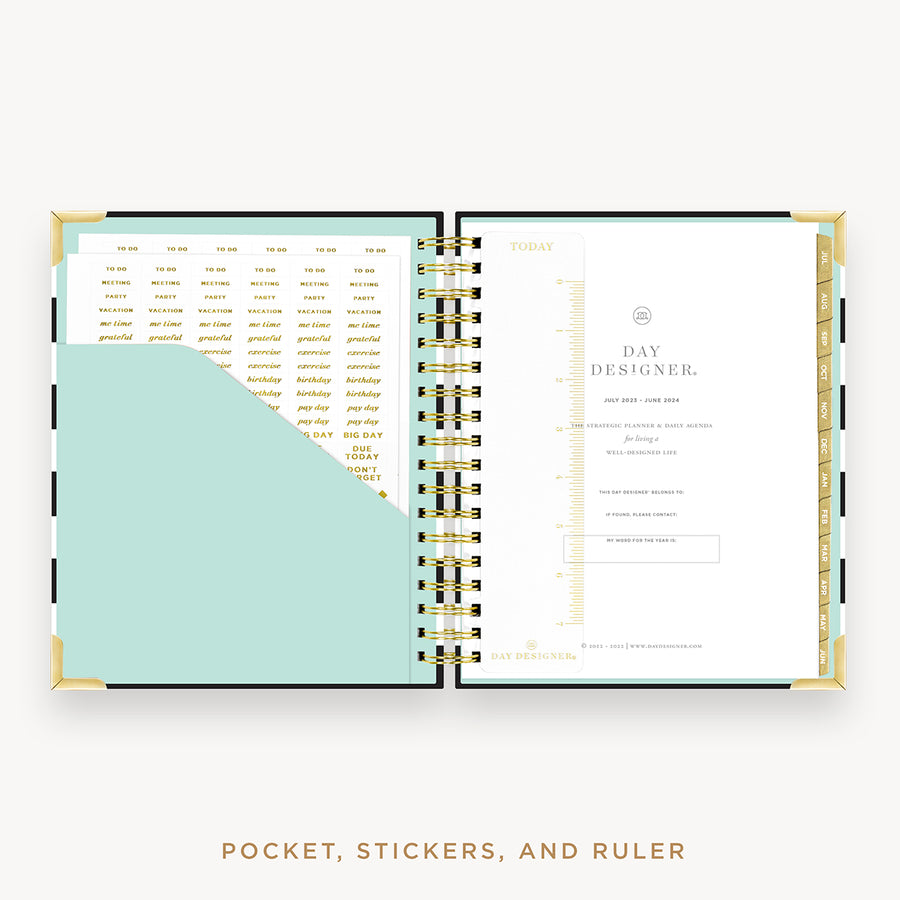 Day Designer's 2023 Daily Planner with Black Stripe cover with pocket sleeve and gold stickers.