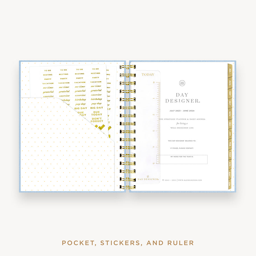 Day Designer's 2023 Daily Mini Planner Chambray Bookcloth with pocket sleeve and gold stickers.