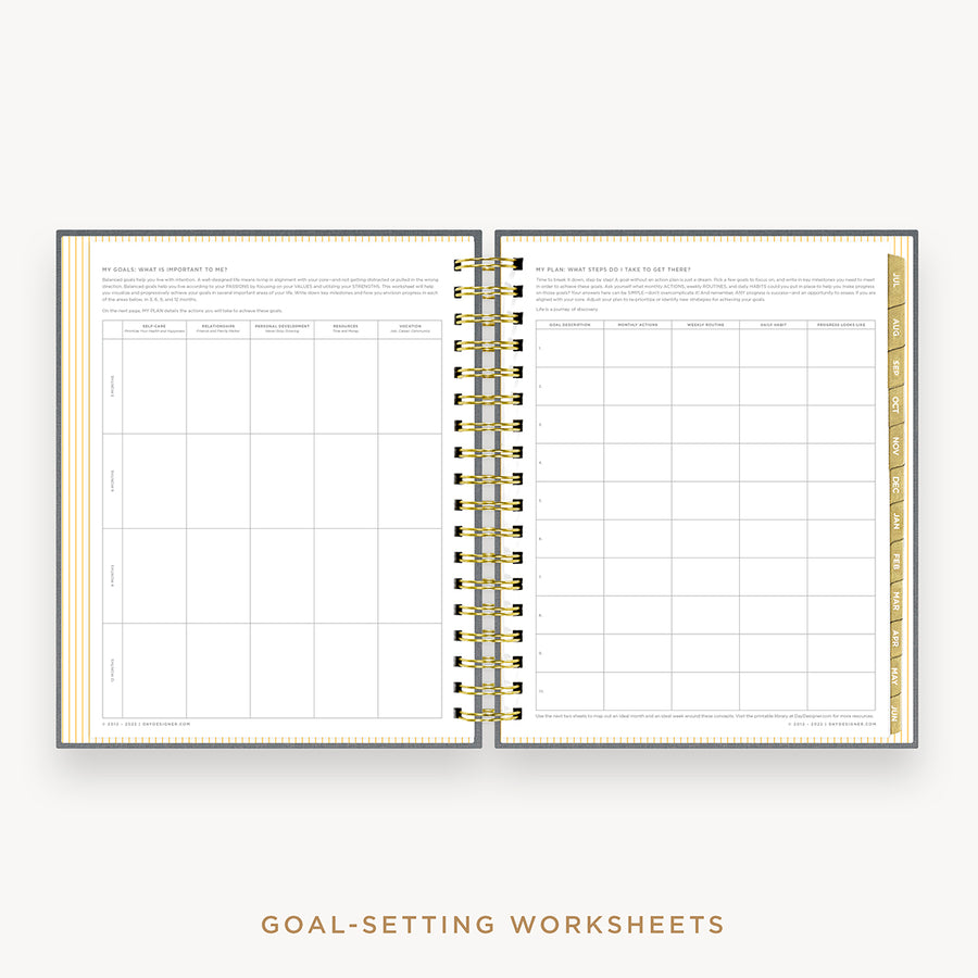 Day Designer's 2023 Daily Planner Charcoal Bookcloth with goals worksheet.