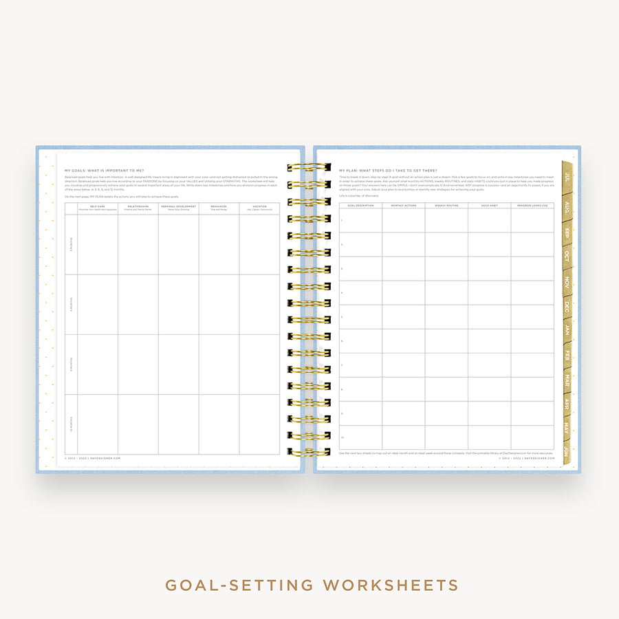 Day Designer's 2023 Daily Planner Chambray Bookcloth with goals worksheet.