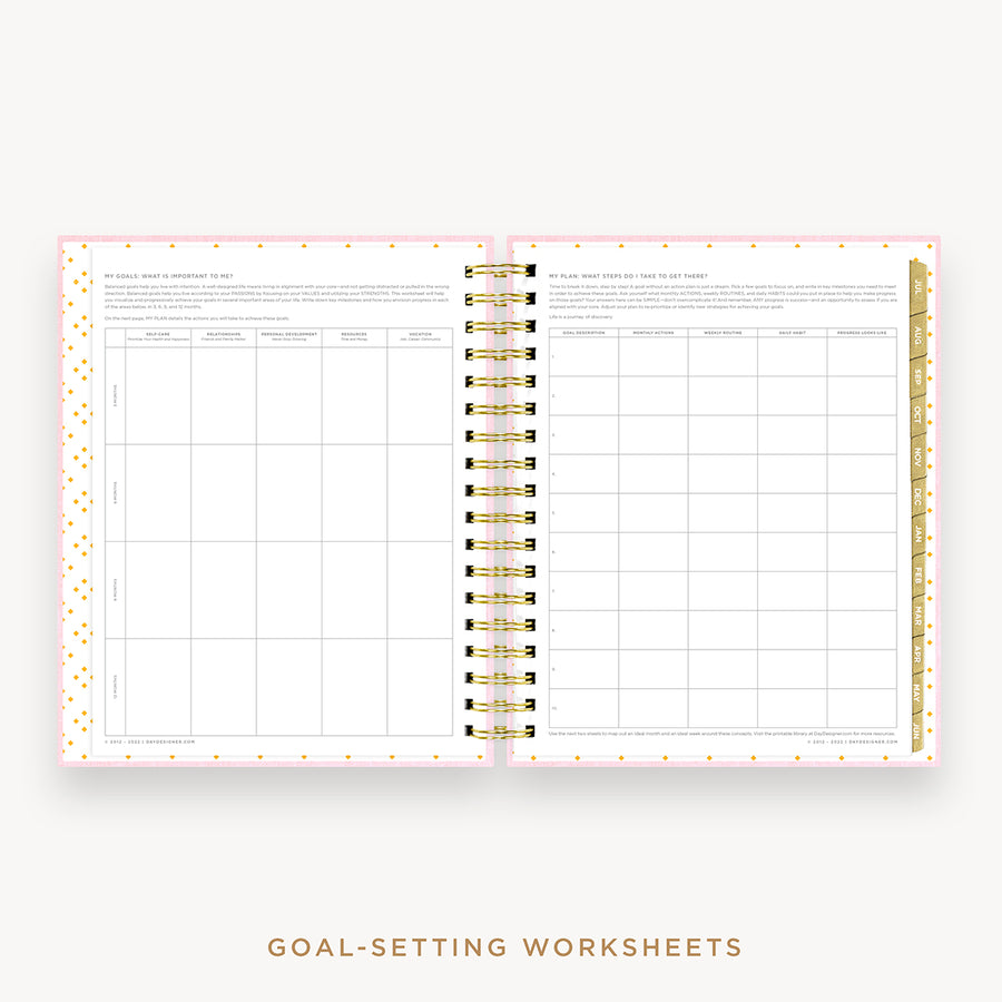 Day Designer's 2023 Daily Planner Peony Bookcloth with goals worksheet.