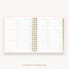 Day Designer's 2023 Daily Planner Peony Bookcloth with a two-page spread of the 2023-2024 calendar year.