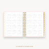 Day Designer's 2023 Daily Mini Planner Peony Bookcloth with a two-page spread of the 2023-2024 calendar year.