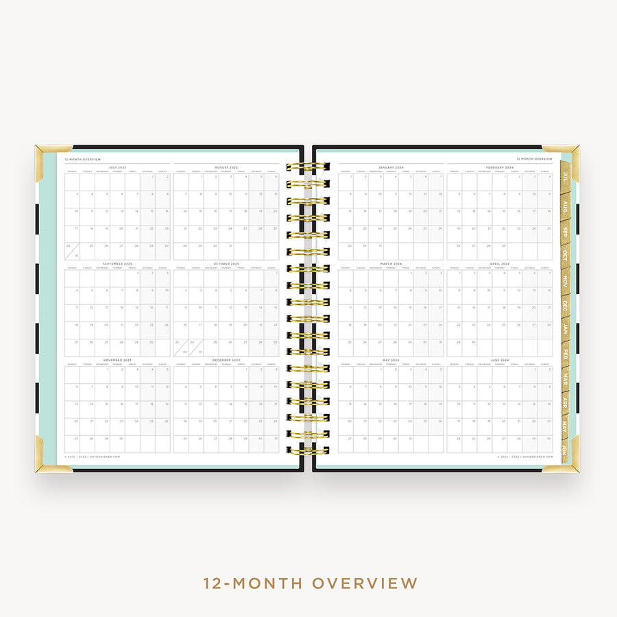 Day Designer's 2023 Daily Planner Black Stripe with a two-page spread of the 2023-2024 calendar year.