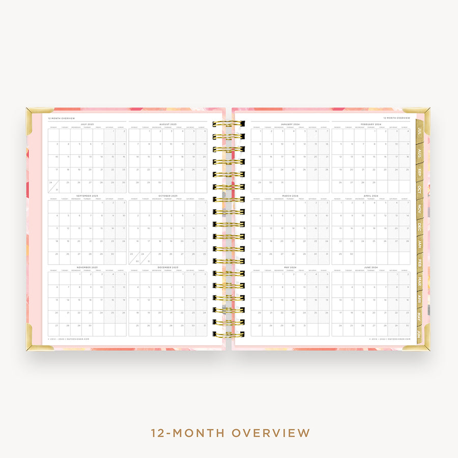 Day Designer's 2023 Daily Planner Sunset with a two-page spread of the 2023-2024 calendar year.