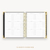 Day Designer's 2023 Daily Planner Classic Dot with a two-page spread of the 2023-2024 calendar year.