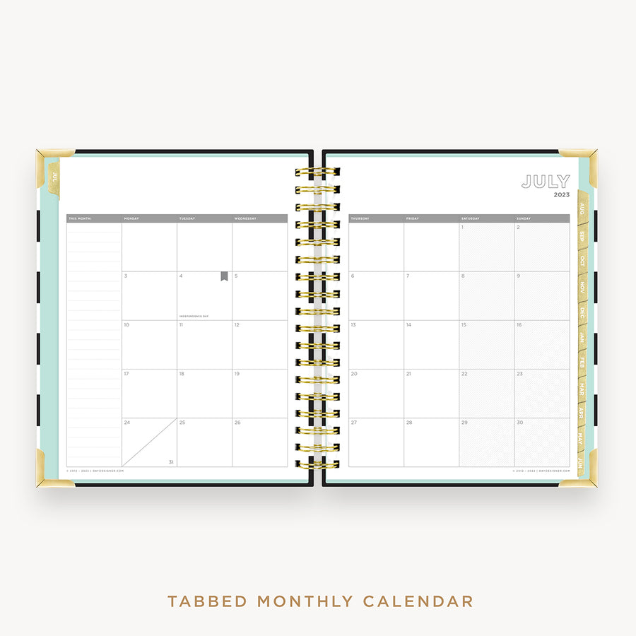 Day Designer's 2023 Daily Planner Black Stripe with monthly calendar planning page.