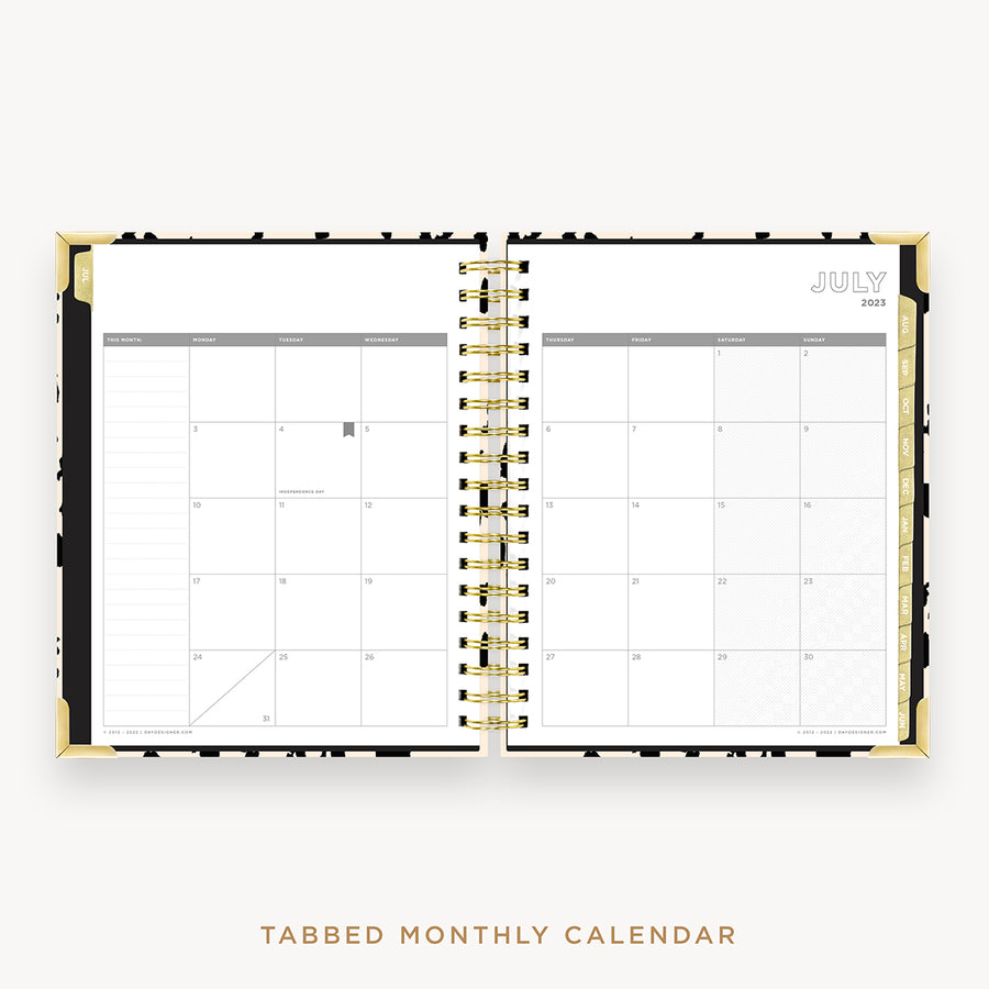 Day Designer's 2023 Daily Planner Painted Leopard with monthly calendar planning page.