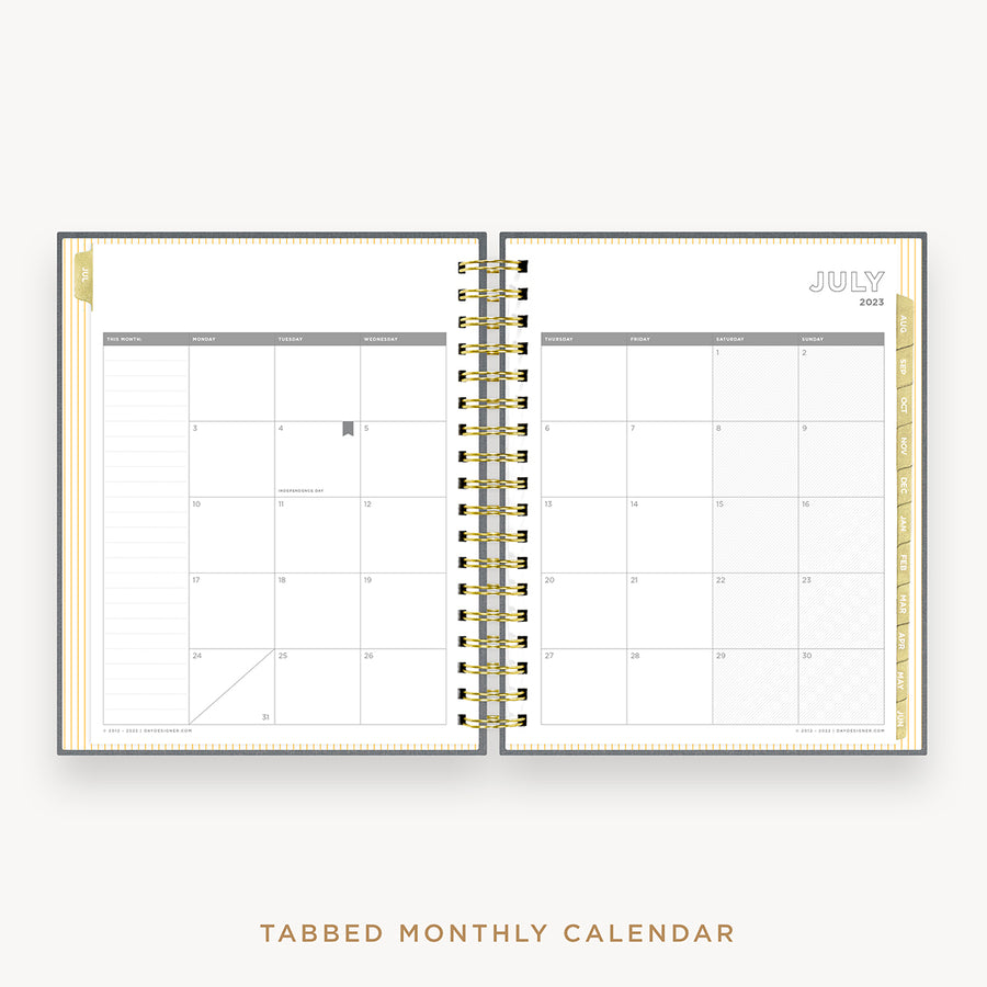Day Designer's 2023 Daily Planner Charcoal Bookcloth with monthly calendar planning page.