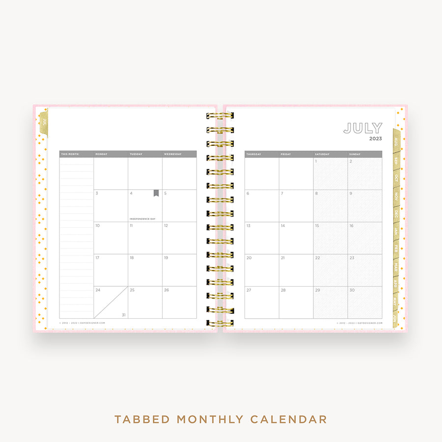 Day Designer's 2023 Daily Mini Planner Peony Bookcloth with monthly calendar planning page.