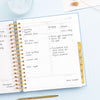 Day Designer 2023-24 Daily Planner Chambray Bookcloth opened with writing on it